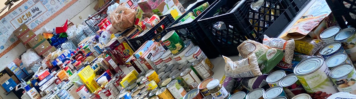 Bags and cans of foods at the food pantry