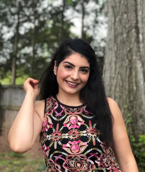 young woman smiling after featured in spotlight photo