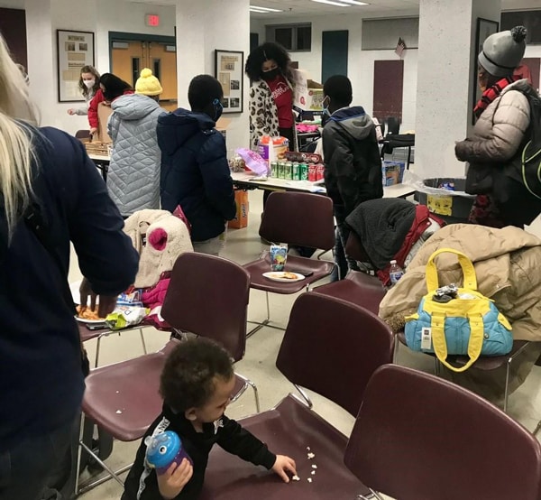 Families gather at the Family Achievement Night movie night