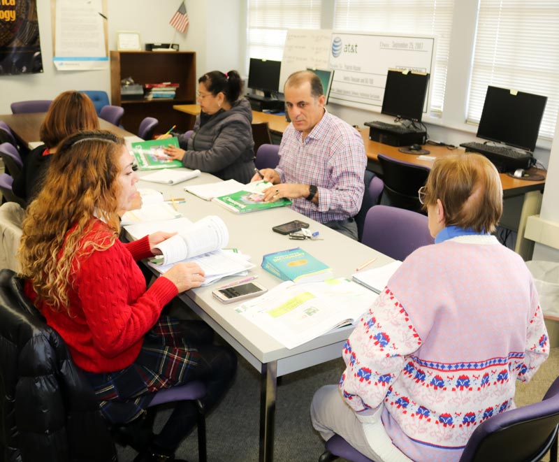 Students learning at the progreso center