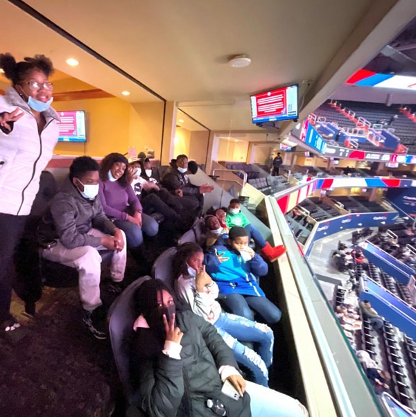 Youth from our community centers enjoying the Wizards basketball game game