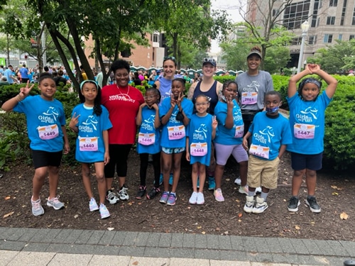 Group of smiling girls before they ran the Girls on the Run end of season 5K