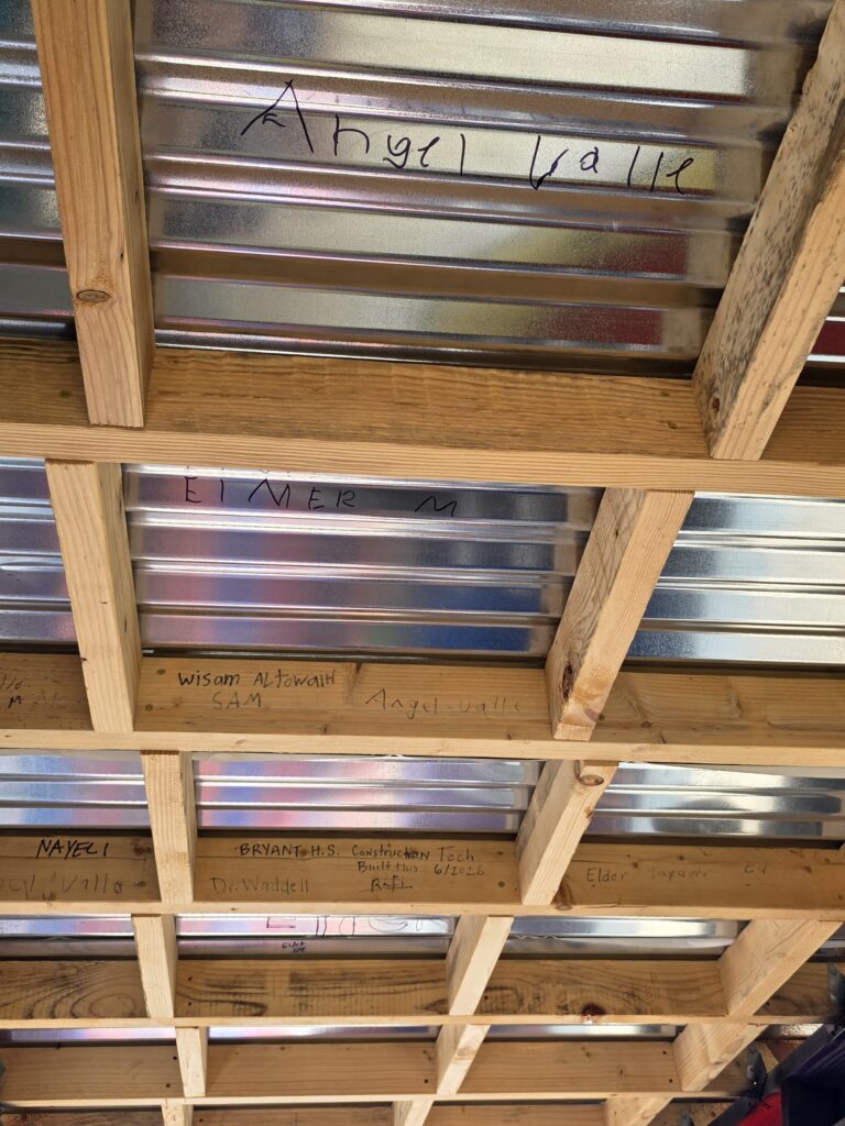 student signatures on tiny house